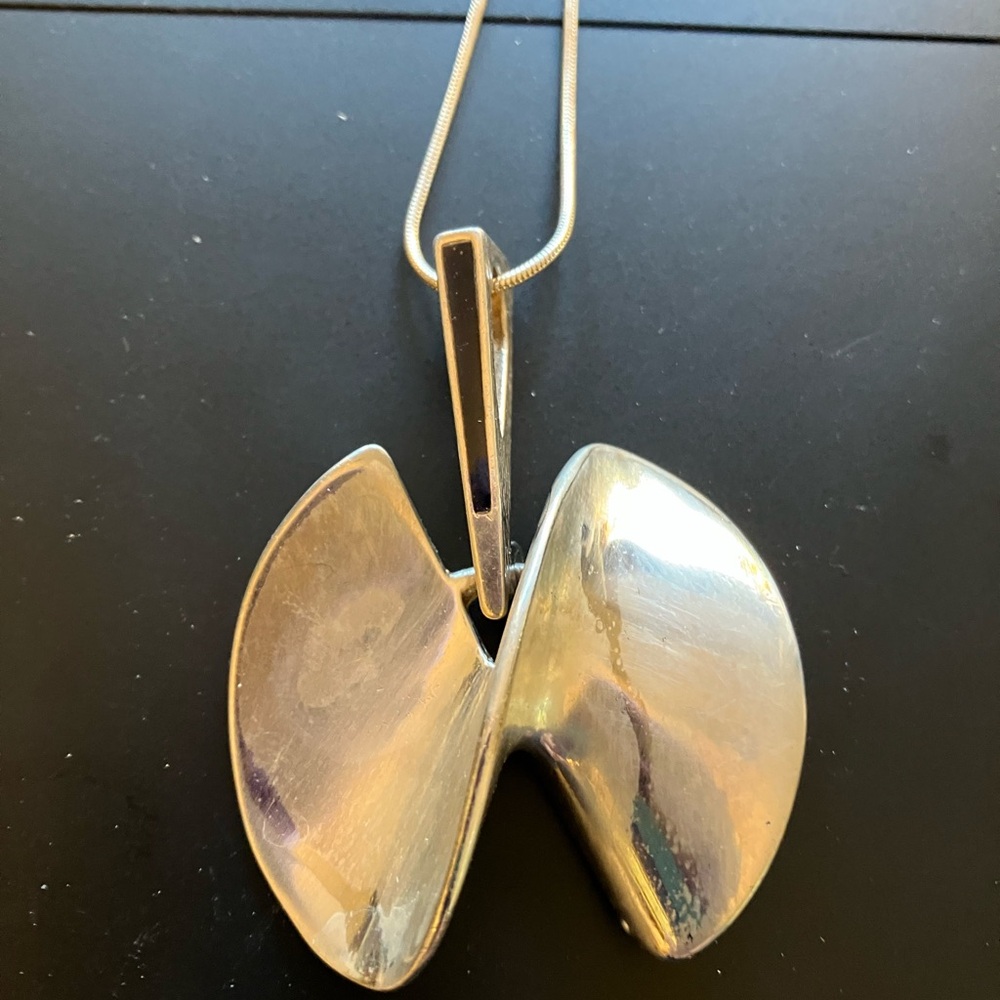 Elegant Sterling Silver Wave Pendant Necklace by Etro